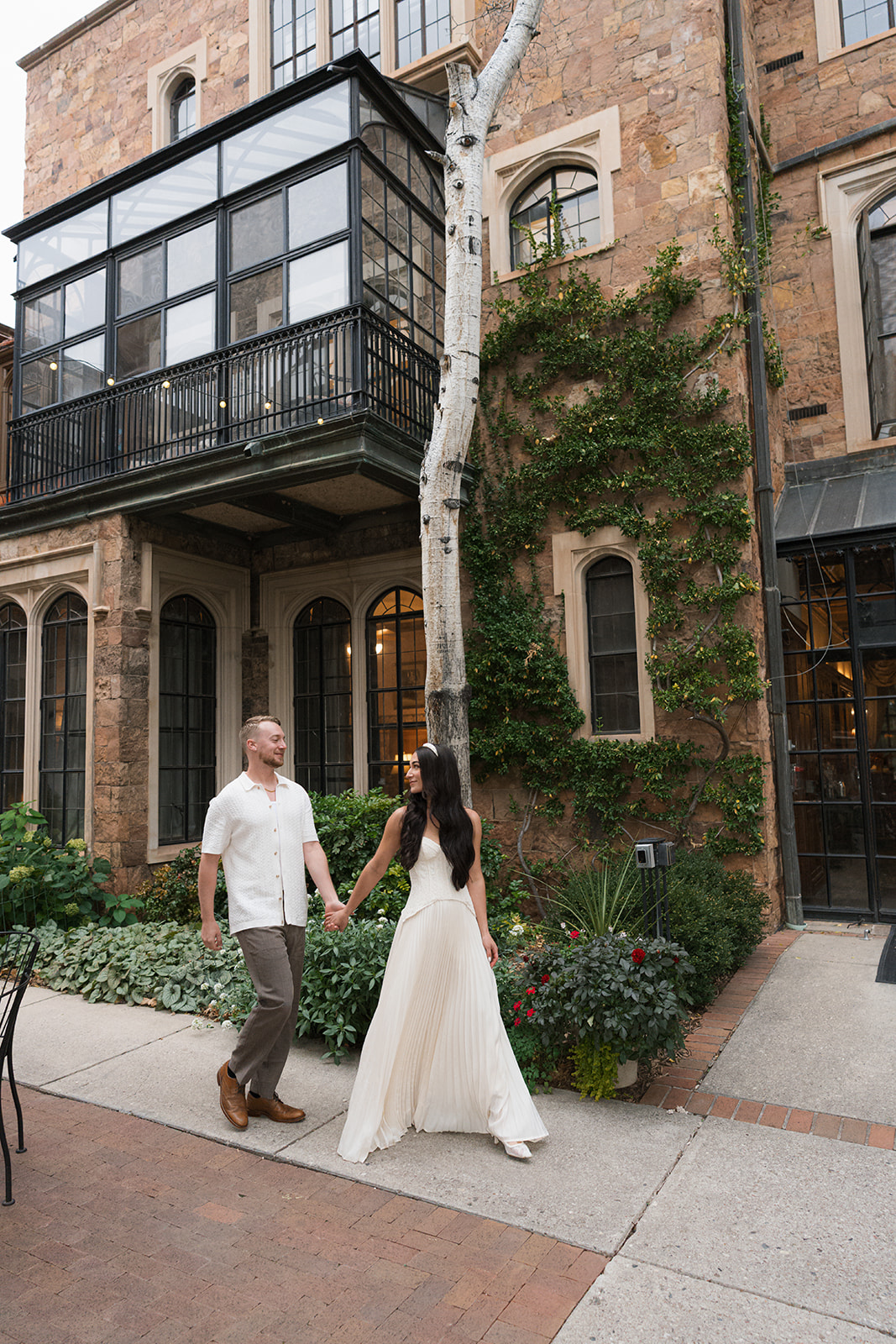 Couple walking castle engagement session